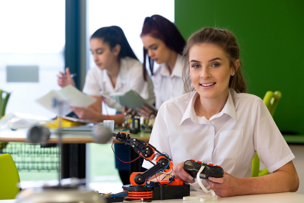 young woman with robot