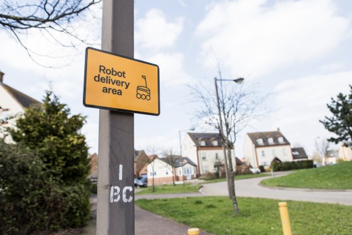 robot delivery area sign