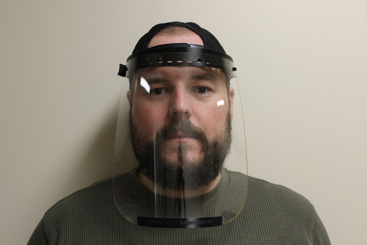 guy wearing face shield