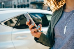 woman holding smartphone