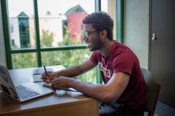 uni student studying in library