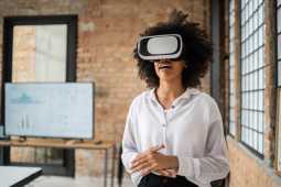 Young woman in a virtual reality meeting in the office